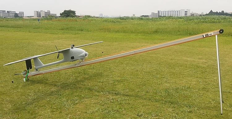 White plastic drone preparing for flight